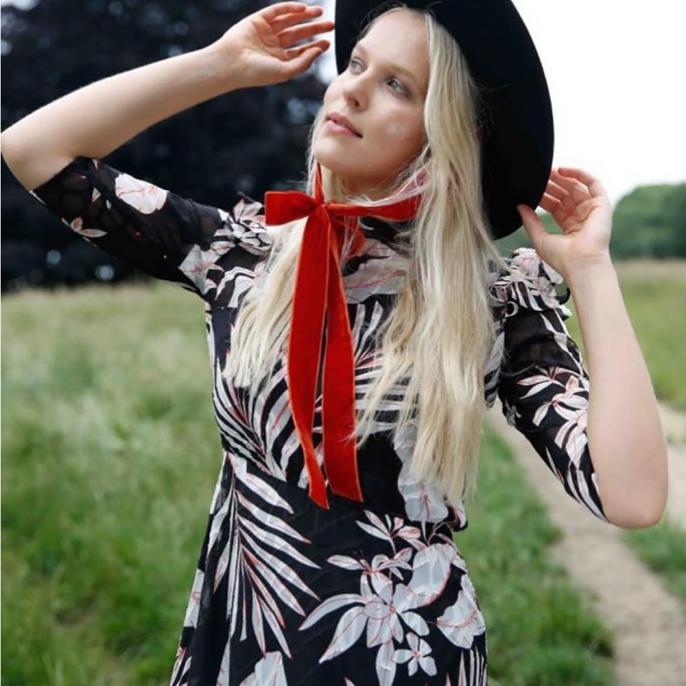 Beautiful House Of Lancry flowy dress. Black with white and Red detail